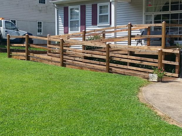 After staining this wheelchair ramp in Red Bank.